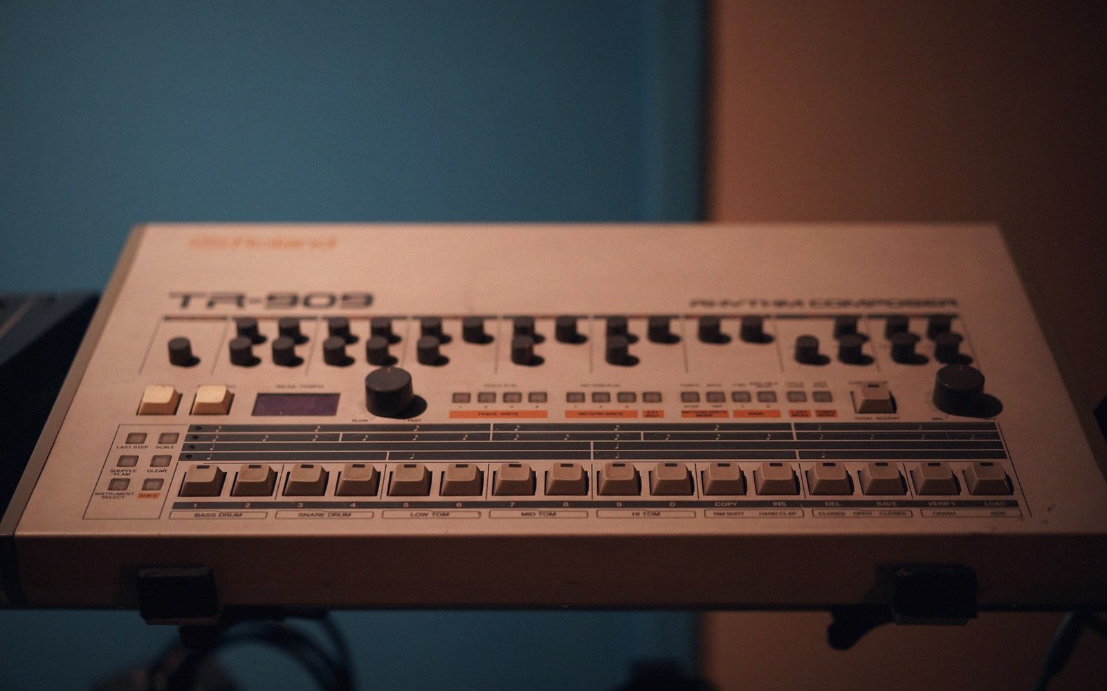 Roland TR-909 rhythm composer drum machine with knobs and step sequencer buttons